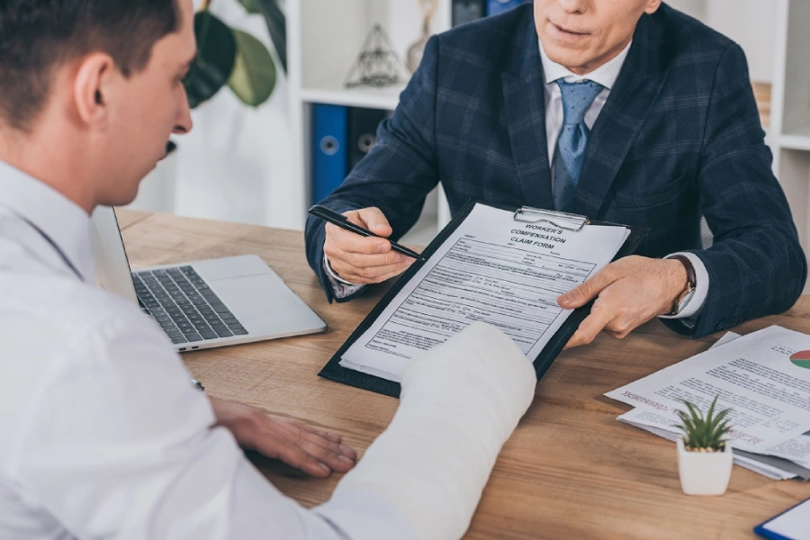 Injured worker talking to lawyer
